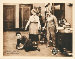 The Pawnshop (Mutual, 1916) with Charlie Chaplin, Edna Purviance, and John Rand. Lobby Card Source