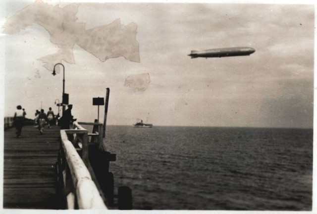 Zeppelin LZ127 Graf Zeppelin flyby over a seaport town in the Balticum 1930. source