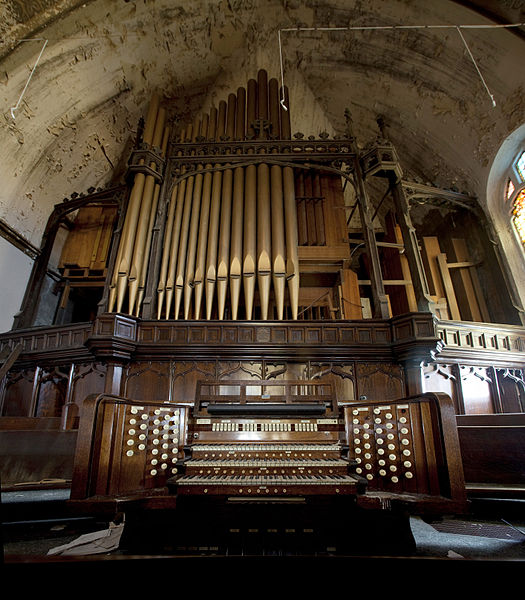 Detail of pipe organ. The building became a victim of theft and vandalism, and its organ pipes were scrapped in the fall of 2009.