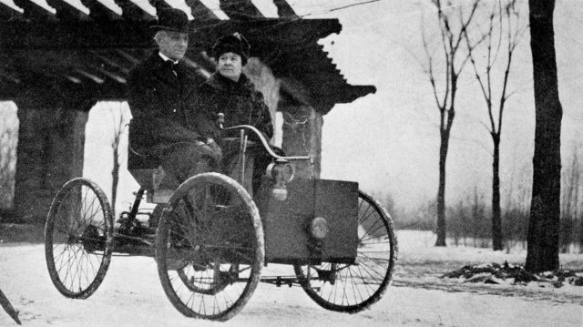 Mr. and Mrs. Henry Ford in his first car, the Ford Quadricycle.