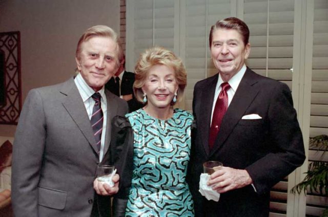 Douglas and wife Anne with President Ronald Reagan, December 1987