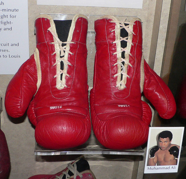 A pair of Muhammad Ali’s boxing gloves is preserved in the Smithsonian Institution National Museum of American History. Photo by Mark Pellegrini CC BY-SA 2.5