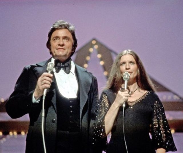Johnny Cash and June Carter performing