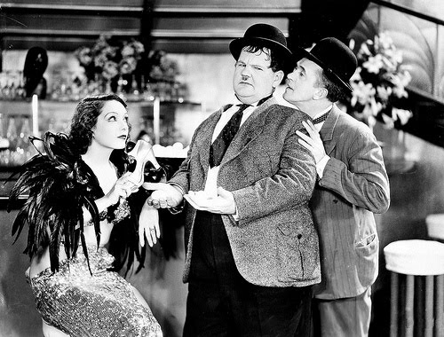 Lupe Vélez with Laurel & Hardy in Hollywood Party (1934).