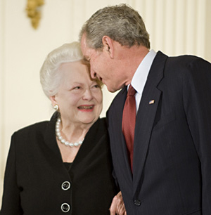 Olivia de HavillandReceiving the National Medal of Arts from President George W. Bush, 2008.