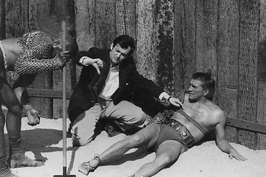 Original studio production still of Stanley Kubrick directing Kirk Douglas in film Spartacus (1960).