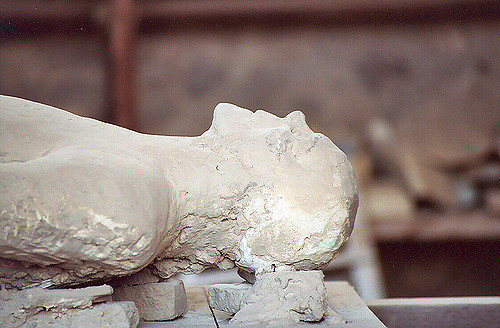 Plaster cast of Pompeii resident. Photo by klndonnelly CC BY2.0