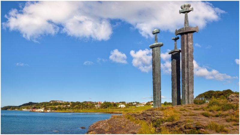 Three giant Viking swords stand buried in a stone in Hafrsfjord ...