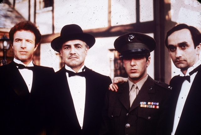 1972: Left to right: American actors James Caan, Marlon Brando, Al Pacino and John Cazale (1936 – 1978) pose together outdoors in a still from director Francis Ford Coppola’s film, ‘The Godfather,’ based on the novel by Mario Puzo. Photo by Paramount Pictures/Fotos International/Getty Images