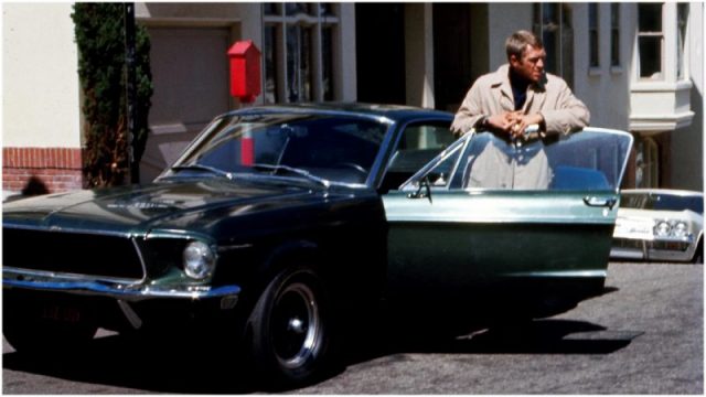 Steve McQueen next to a Ford Mustang 390 GT 2+2 Fastback in the movie ‘Bullitt,’ San Francisco, 1968. Photo by Silver Screen Collection/Getty Images