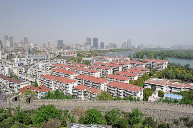 “Apartment buildings by Ming City Wall in Nanjing, China”