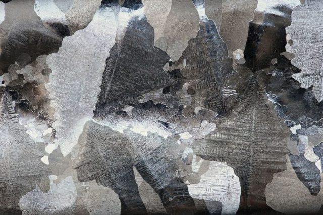 Bar of aluminium (Al) crystal growth raw material, with visible dendrites on the macroetched surface, from the collection of Ethan Currens.