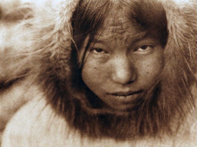 Photo of an Inuit woman by American photographer and ethnologist Edward S. Curtis