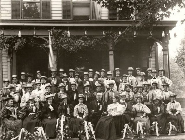 William and Ida McKinley (to her husband’s left) pose with members of the “Flower Delegation” from Oil City, Pennsylvania, before the McKinley home. Although women could not vote in most states, they might influence male relatives and were encouraged to visit Canton.