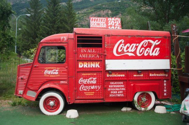 Paint it red: A vintage model of a Coca Cola Company delivery vehicle from Richmond, Virgina. On display at a bar in Benasque, Spain. Photo taken July 9, 2011.