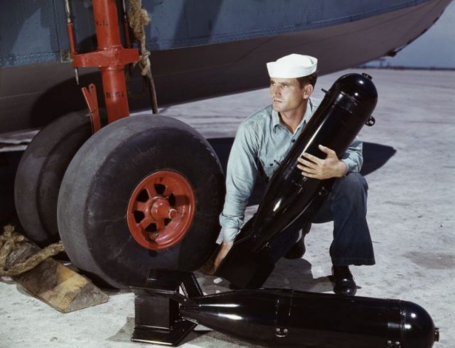 J.D. Estes, a seven-year Navy veteran, here loading some munitions into an aircraft at the Corpus Christi naval air station.