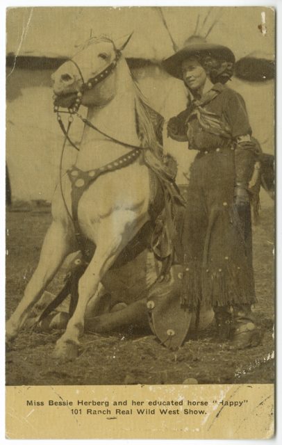 Miss Bessie Herberg was certainly happy with her horse named Happy. The year is 1910.