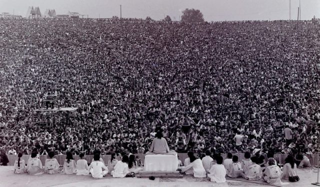 Opening ceremony at Woodstock. Swami Satchidananda giving the opening speech