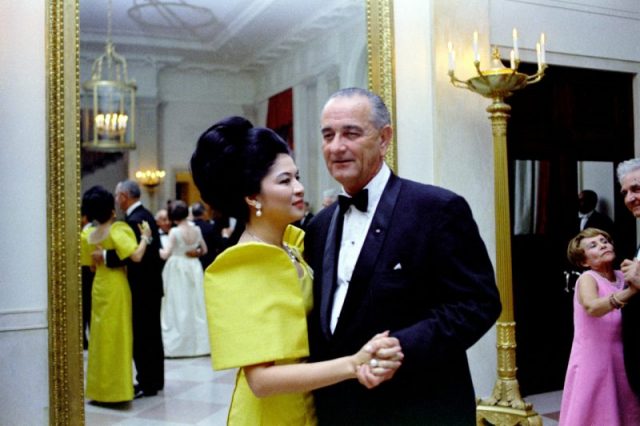 Philippine first lady Imelda Marcos with U.S. President Lyndon B. Johnson while sporting her iconic bouffant hairstyle, 1966