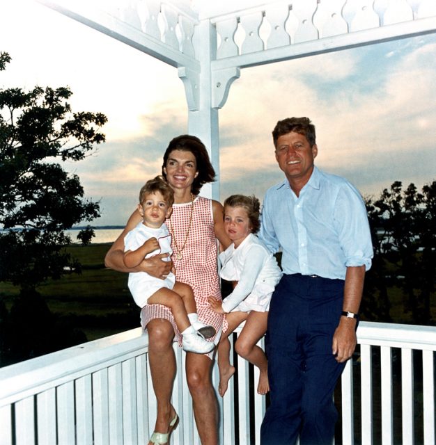 President John F. Kennedy, First Lady Jacqueline Kennedy, and their children, John Jr. and Caroline, at their summer house in Hyannis Port, Massachusetts.
