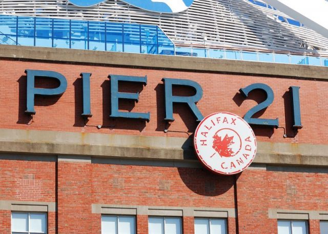 Sign of Pier 21. Photo by Taxiarchos228 CC BY SA 3.0