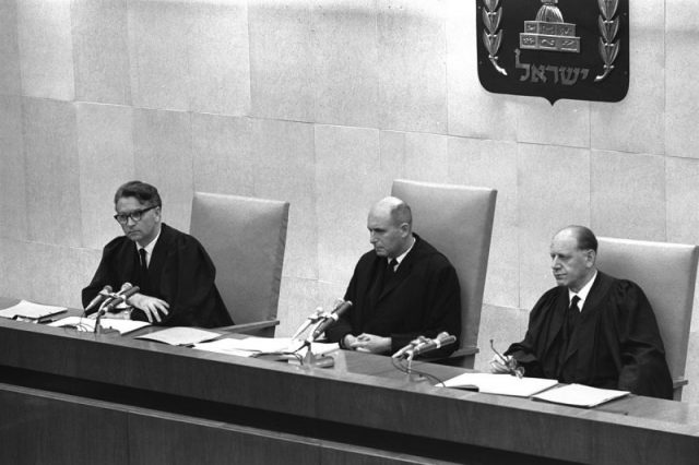 The three-judge panel trying Eichmann’s case consisted of Justice Moshe Landau, Dr.Benjamin Halevy, and Dr. Yitzhak Raveh.