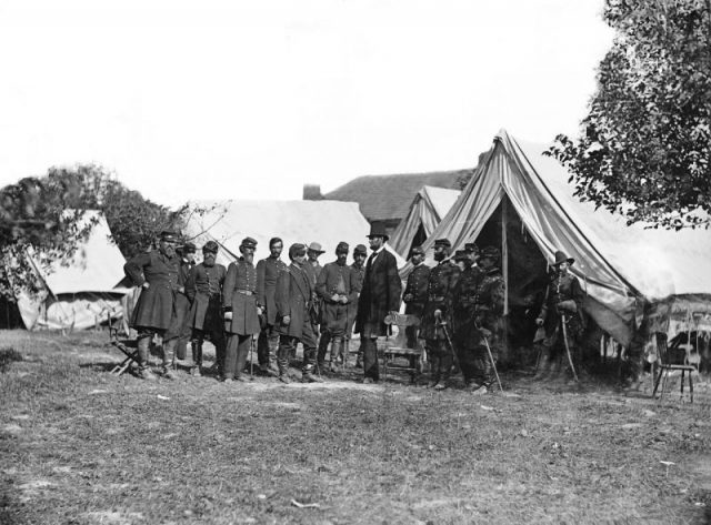 Custer (extreme right) with President Lincoln, General McClellan and other officers at the Battle of Antietam, 1862.