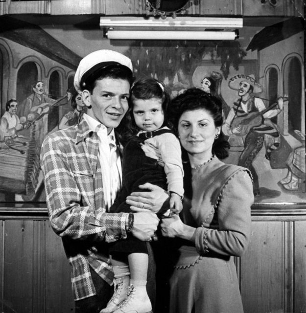 Singer Frank Sinatra with his daughter Nancy, 3, and 1st wife Nancy at home. Photo by Herbert Gehr/The LIFE Images Collection/Getty Images