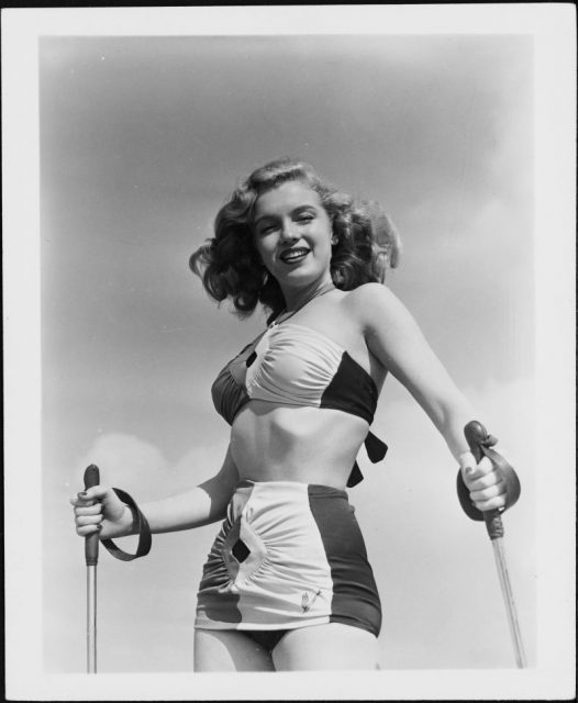 Norma Jeane Baker tries her hand at sand skiing, c.1943.