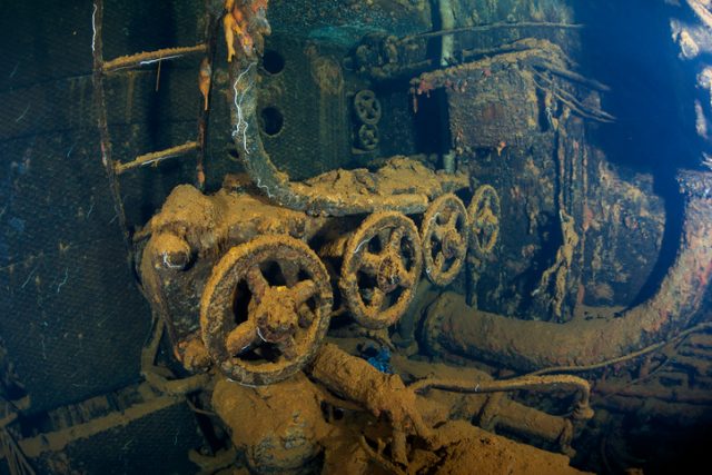 Valve wheels inside the engine room of sunken Japanese ship Kiyosumi Maru. The ship was sunk in Truck Lagoon on February 16, 1944, by the U.S. Navy during Operation Hailstorm.