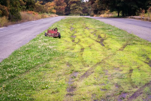 A childs toy go-cart sits abandoned on an empty road in Centralia, Pennsylvania, a poignant reminder of the catastrophe that struck the town in 1962.