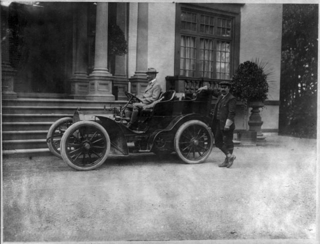 John Jacob Astor, 1864-1912, in automobile.