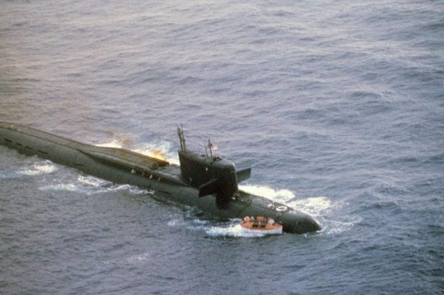 A starboard bow view of the Soviet Yankee class nuclear-powered ballistic missile submarine that was damaged by an internal liquid missile propellant explosion. Three days later the ship sank in 18,000 feet of water.