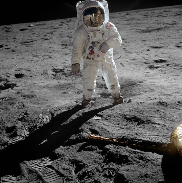 Buzz Aldrin poses on the Moon, allowing Neil Armstrong to photograph both of them using the visor’s reflection.