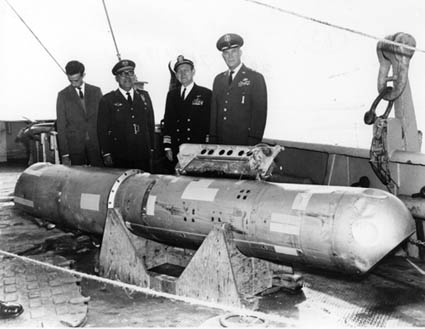 Eighty days after it fell into the ocean following the January 1966 midair collision between a nuclear-armed B-52G bomber and a KC-135 refueling tanker over Palomares, Spain, this B28RI nuclear bomb was recovered from 2,850 feet (869 meters) of water and lifted aboard the USS Petrel (note the missing tail fins and badly dented “false nose”).