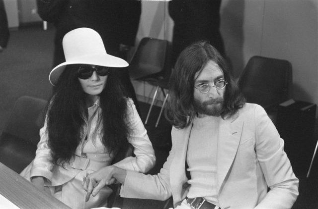 Yoko Ono and John Lennon at Schiphol. Photo by Joost Evers/Anefo CC BY-SA 3.0 nl