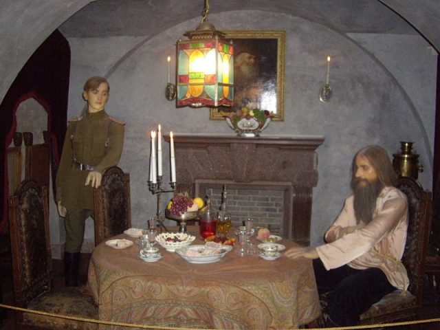 Rasputin and Yusupov (wax figures) in the fancy basement, a former wine cellar in the Yusopov Palace. Photo by Николай Мылюев CC By SA 3.0