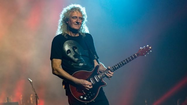 Brian May (pictured in 2017) playing his custom-made Red Special. Photo by Raph_PH CC BY 2.0