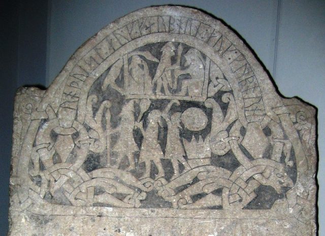 Detail from runestone G 181 in the Swedish Museum of National Antiquities in Stockholm. The three men are interpreted as the Norse gods Odin, Thor, and Freyr.