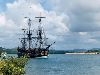 HMS Endeavour replica in Cooktown Harbour, Queensland — anchored where the original Endeavour was beached for seven weeks in 1770.