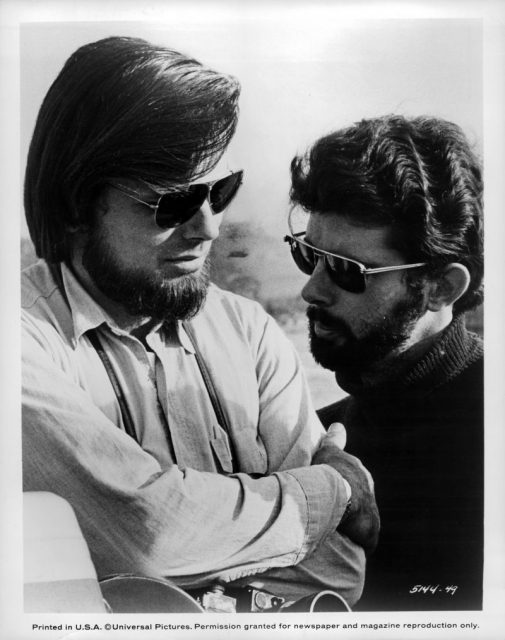 Director George Lucas and co-producer Gary Kurtz wearing sunglasses on the sets of the film ‘American Graffiti’, 1973. (Photo by Universal Pictures/Getty Images)