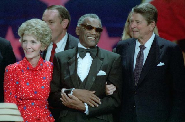 Charles with President Ronald Reagan and First Lady Nancy Reagan, 1984.