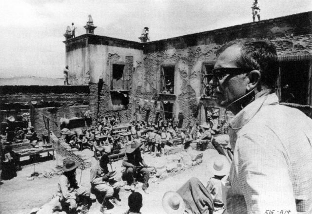 Production still for the film ‘The Wild Bunch.’ Director Sam Peckinpah on right.