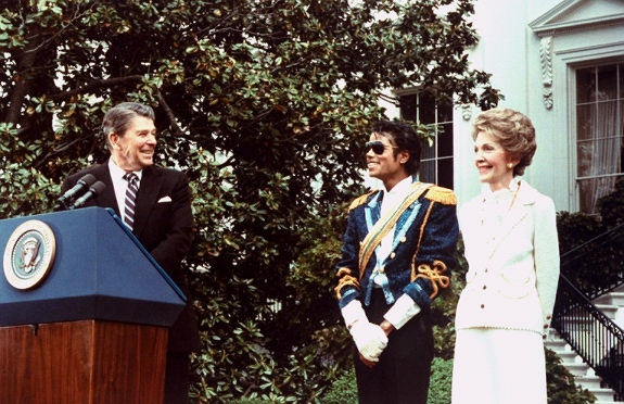 Jackson at the White House being presented with an award by President Ronald Reagan and First Lady Nancy Reagan, 1984.