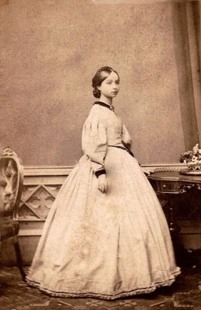 Young lady in white dress from the 1860s
