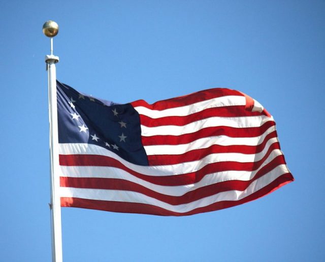 A “Betsy Ross” flag flying outside San Francisco City Hall, in San Francisco, California.