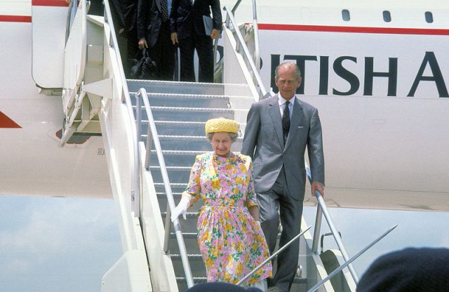 Queen Elizabeth II and Prince Philip disembark from a British Airways Concord.