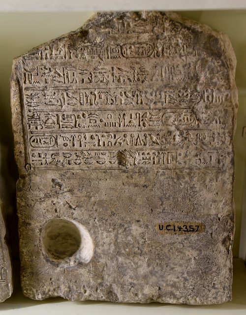 A limestone stela of the High Priest of Ptah bearing the cartouches of Cleopatra and Caesarion, Egypt, Ptolemaic Period, the Petrie Museum of Egyptian Archaeology, London.