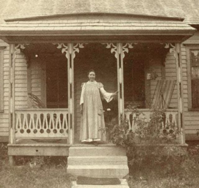 A young Laura Ingalls Wilder on the porch of her rented home in Mansfield, Missouri, c. 1898. Photo by Herbert Hoover Presidential Library