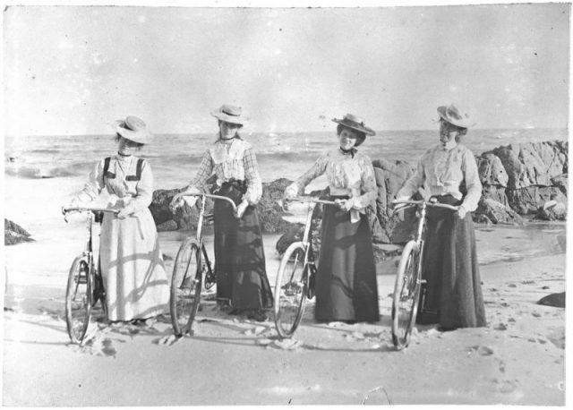 Four young women with their bicycles on the beach, Moruya, New South Wales, c. 1900
